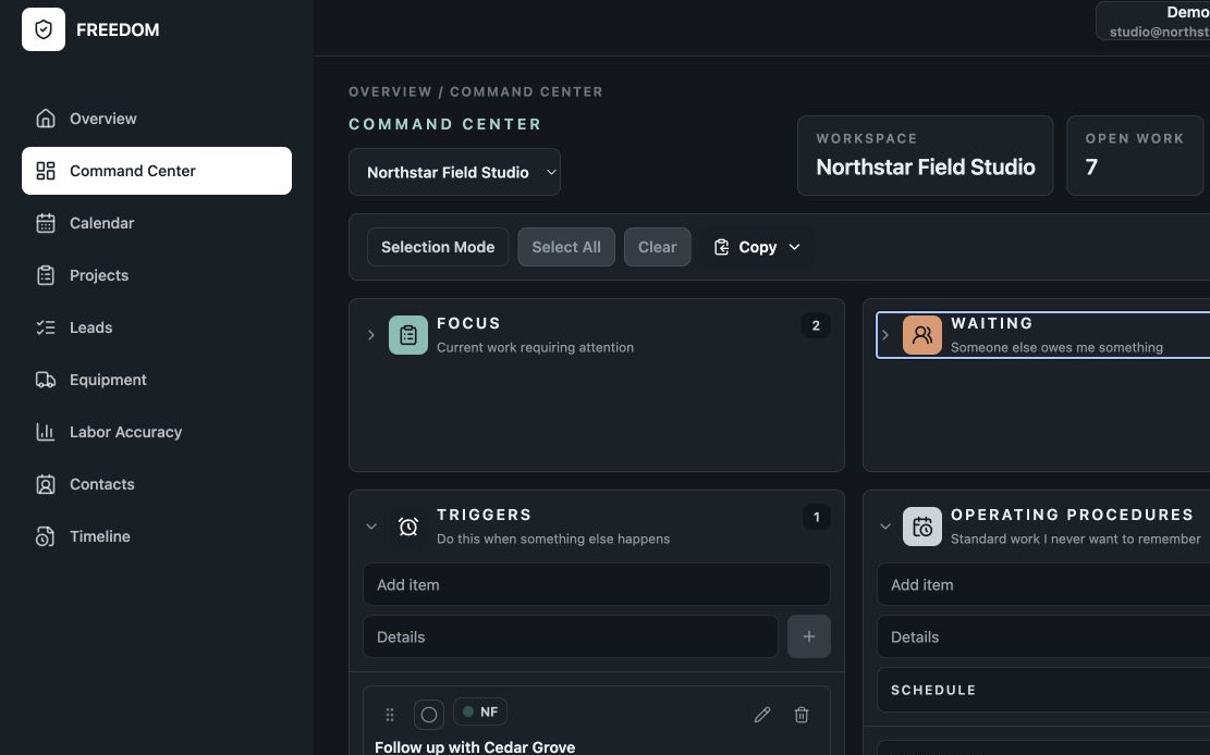 FREEDOM Command Center with a business workspace selector and operational work organized by stage.